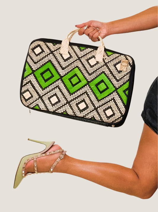A person holding the Tala Woven Laptop Bag outdoors, highlighting the stylish and durable design crafted by Filipino artisans.