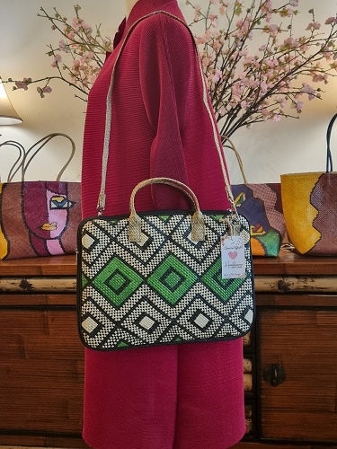 Tala Woven Laptop Bag worn as a shoulder bag with a stylish professional outfit, perfect for everyday use and laptop protection